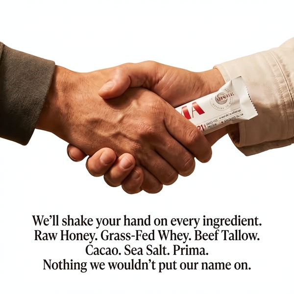 A close-up photograph of a handshake with one person holding a protein bar, emphasizing ingredient trust and brand transparency.